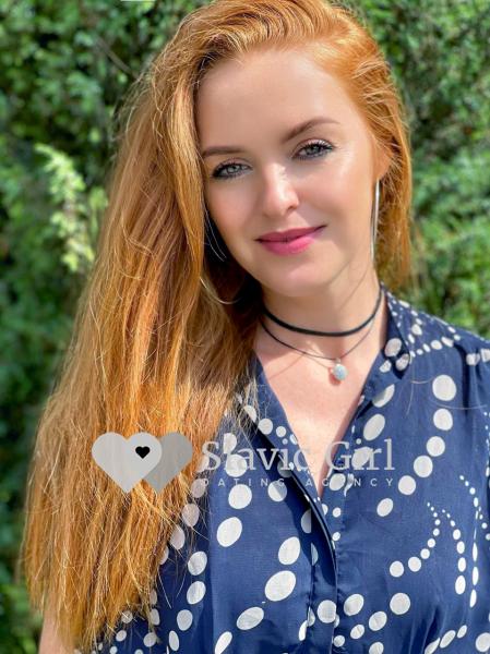 Very attractive young woman close up portrait. Beautiful female indoor.  Curly haired lady. Red-haired girl. Redhead with wavy hair. Stock Photo |  Adobe Stock